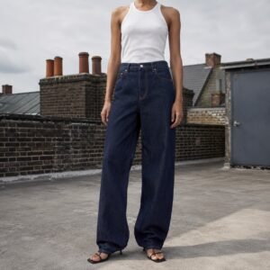 Golden Wide Leg Jean — Jeans by YOON SYM. worn by a model.