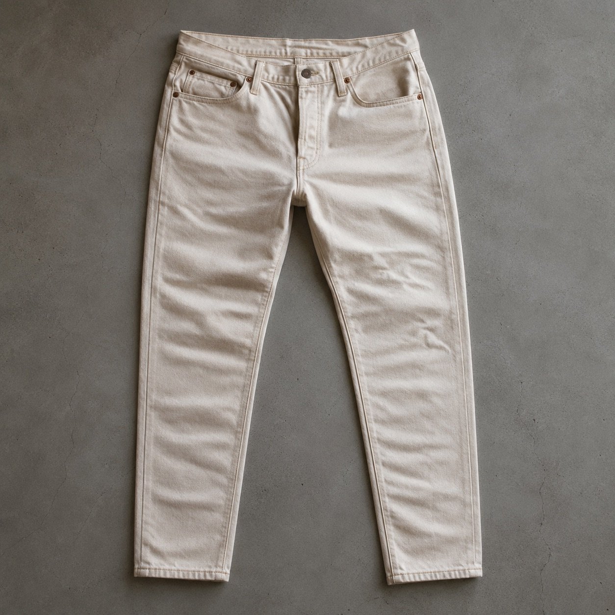 Warwick Slim Tapered Jean — Jeans by YOON SYM. close detail of the fabric and finish.