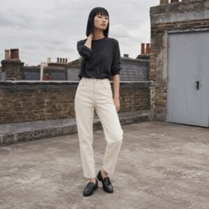 Warwick Slim Tapered Jean — Jeans by YOON SYM. worn by a model.