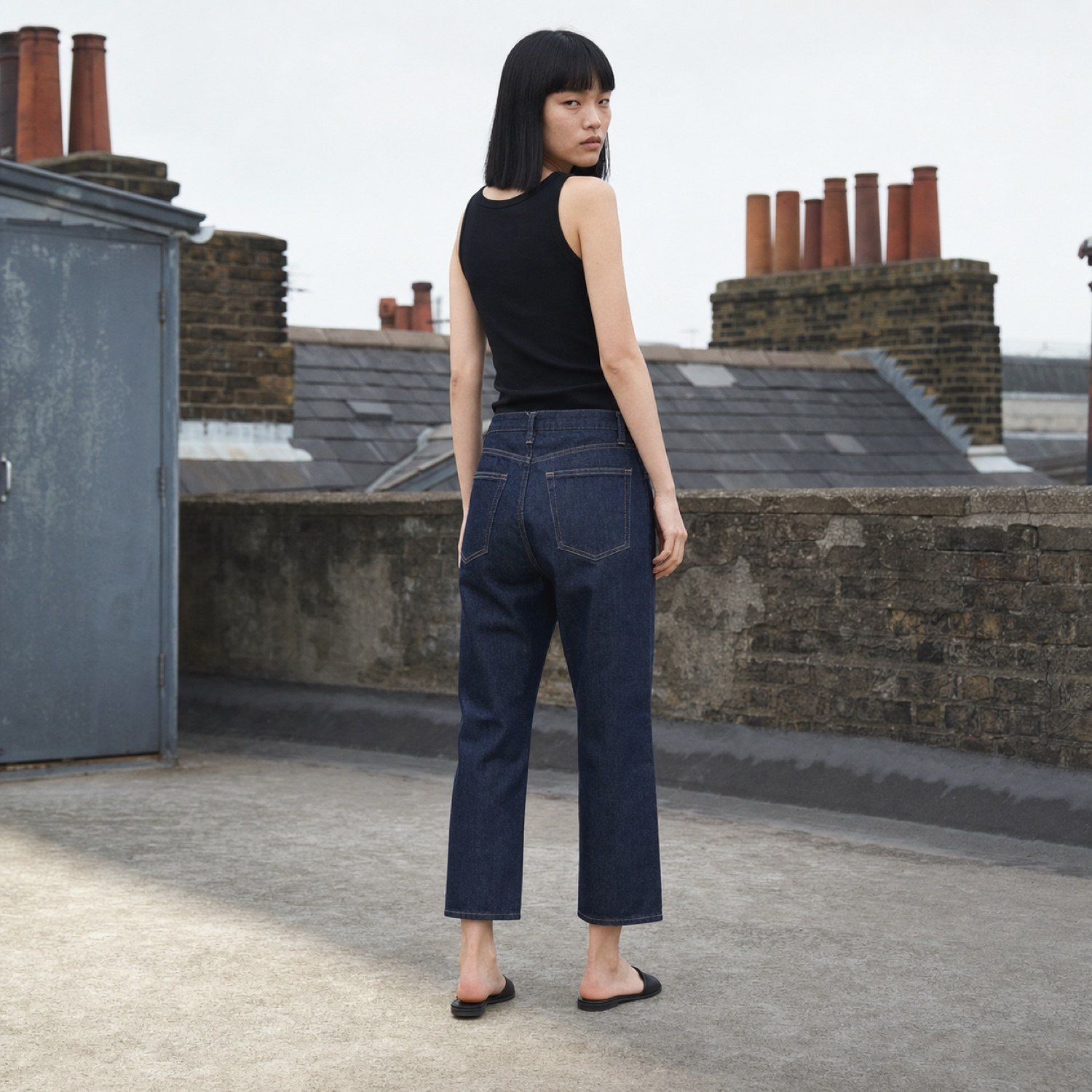 Beak Cropped Straight Jean — Jeans by YOON SYM. worn by a model, side view.