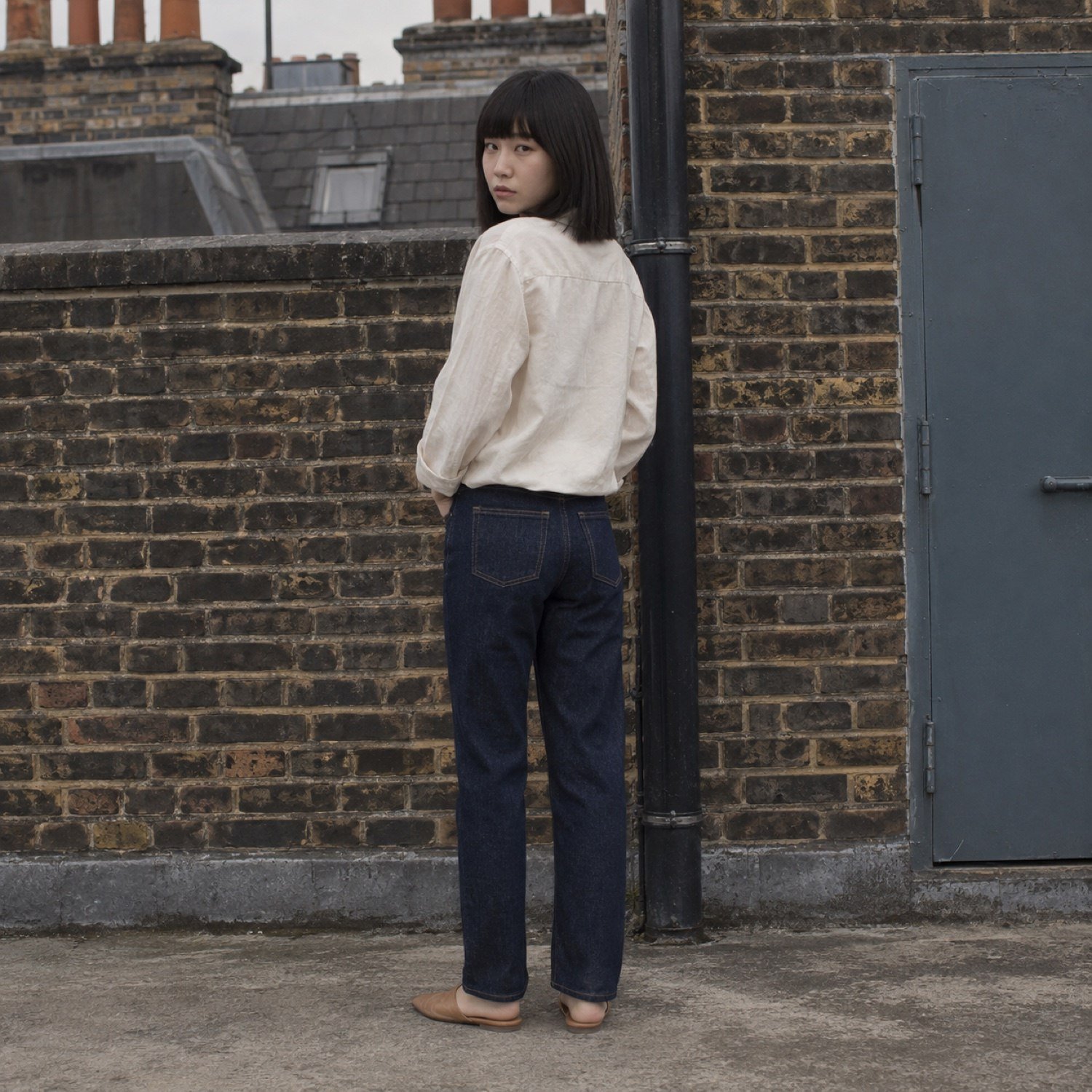 Ganton Straight Leg Jean — Jeans by YOON SYM. worn by a model, side view.