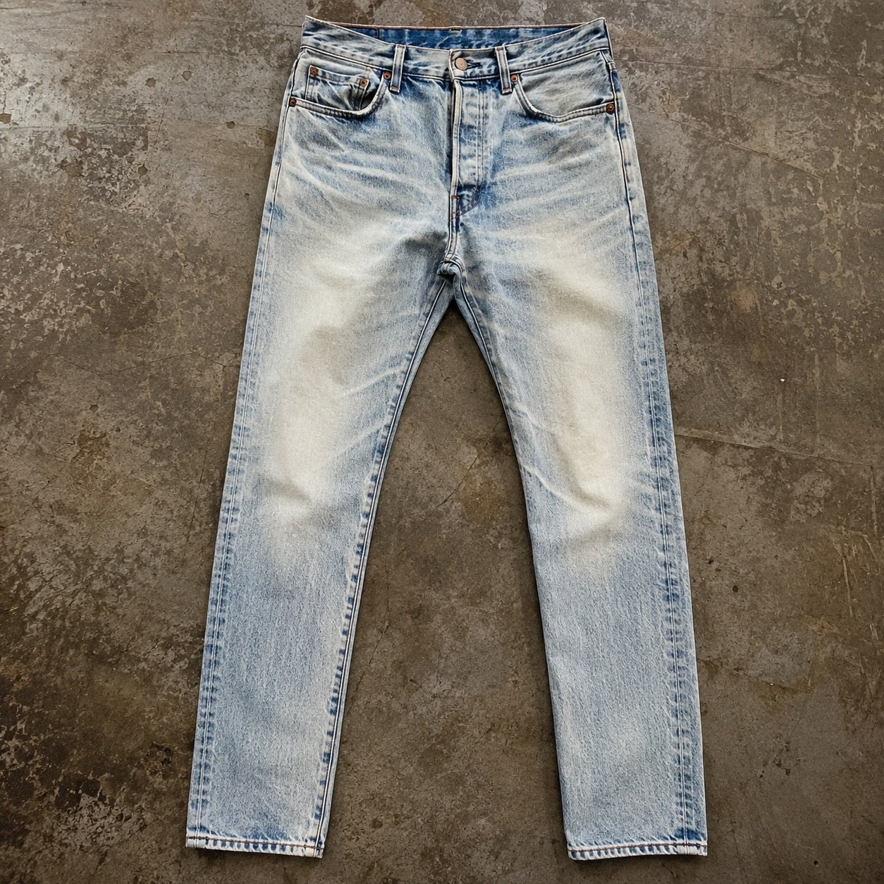 Poland Slim Tapered Jean — Jeans by YOON SYM. close detail of the fabric and finish.