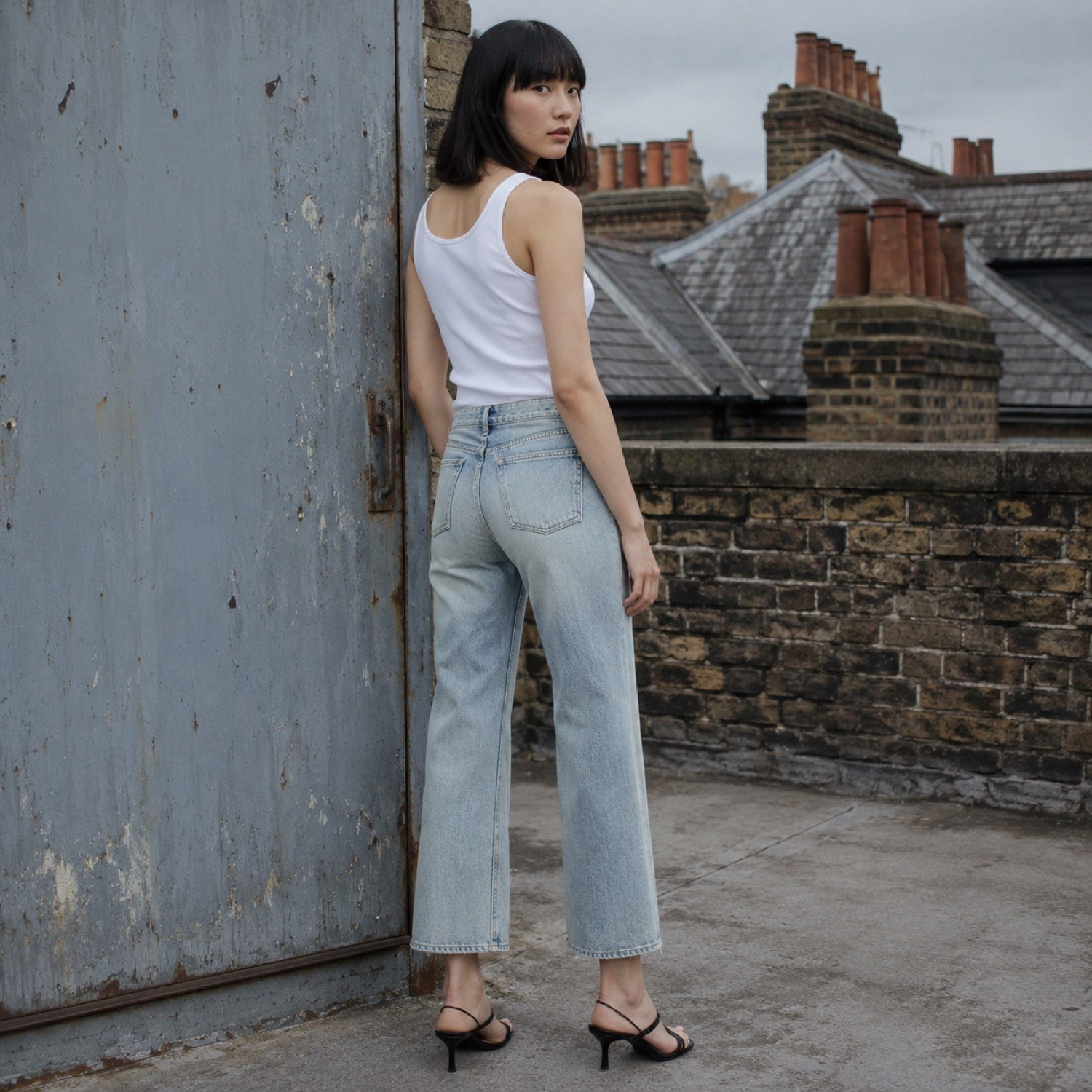 Carnaby Cropped Straight Jean — Jeans by YOON SYM. worn by a model, side view.