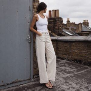 Golden Wide Leg Jean — Jeans by YOON SYM. worn by a model.