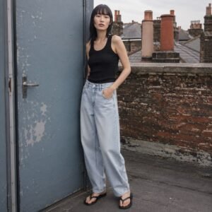 Warwick Barrel Leg Jean — Jeans by YOON SYM. worn by a model.