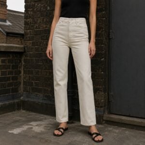 Denman High Rise Straight Jean — Jeans by YOON SYM. worn by a model.