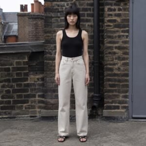 Denman High Rise Straight Jean — Jeans by YOON SYM. worn by a model.