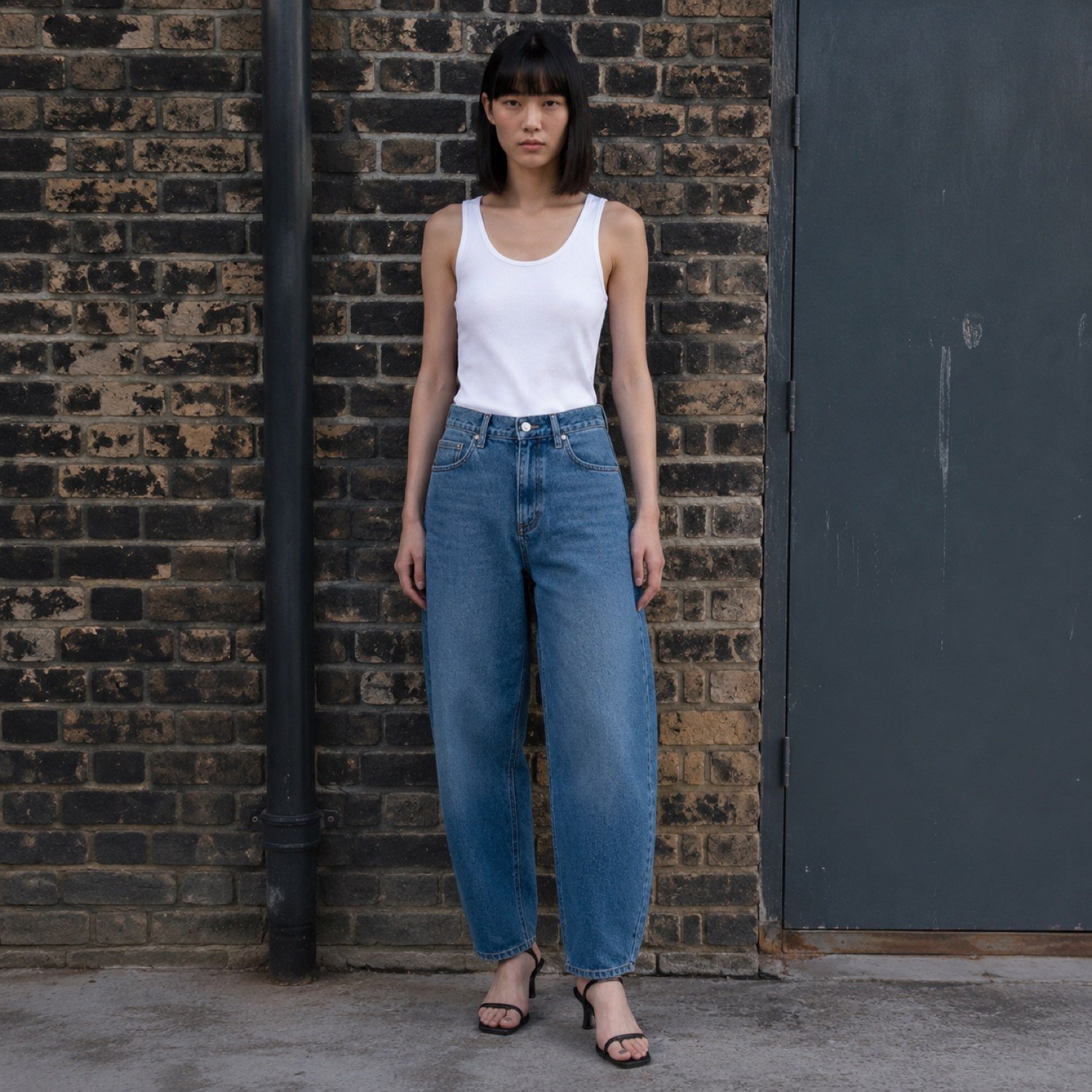Soho Barrel Leg Jean — Jeans by YOON SYM. worn by a model.