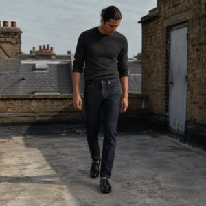 Warwick Slim Tapered Jean — Jeans by YOON SYM. worn by a model.