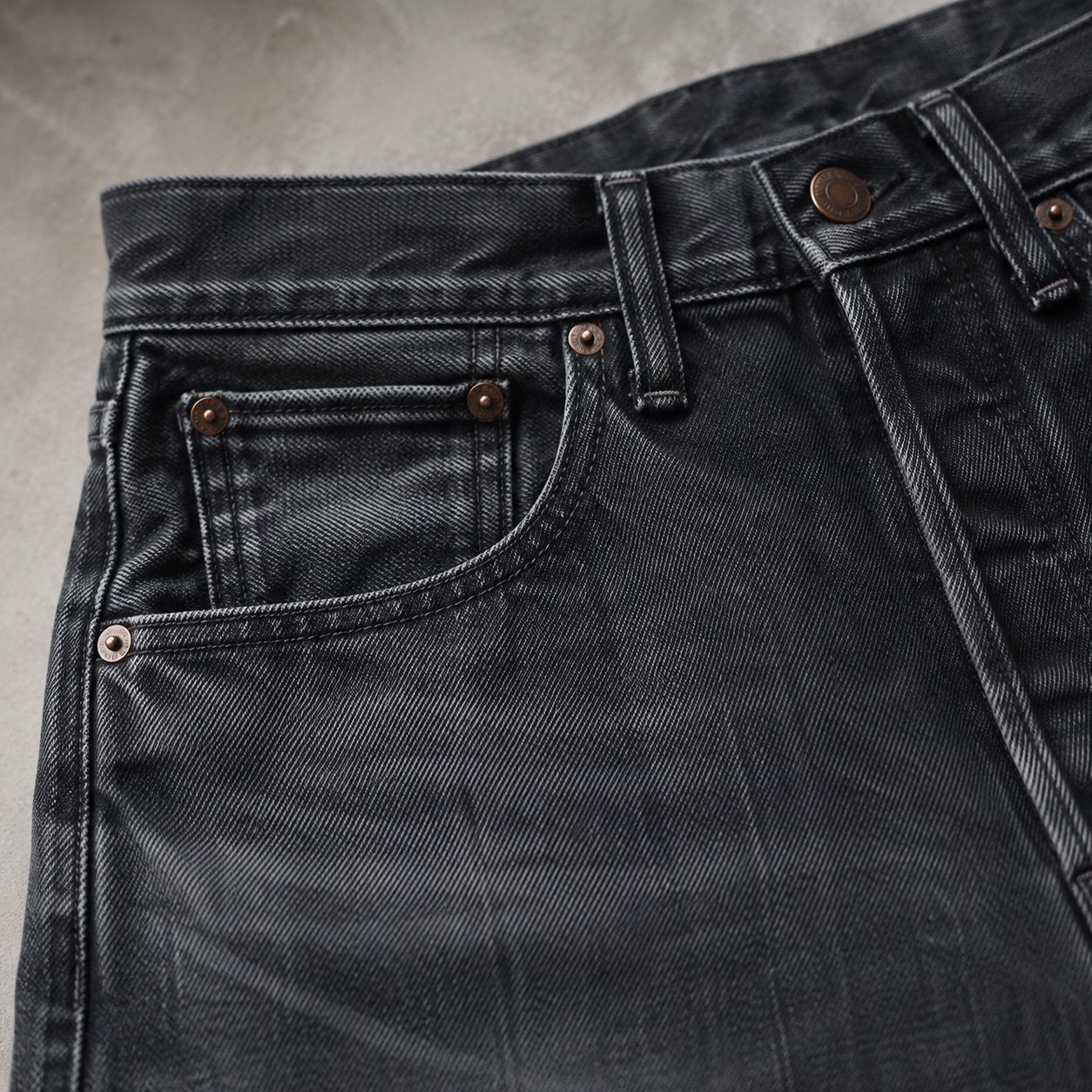 Noel High Rise Straight Jean — Jeans by YOON SYM. close detail of the fabric and finish.