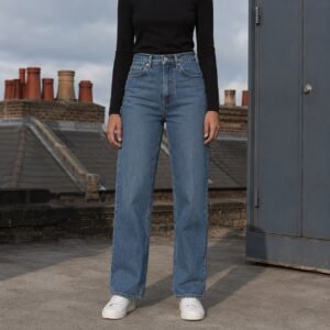 Denman High Rise Straight Jean — Jeans by YOON SYM. worn by a model.