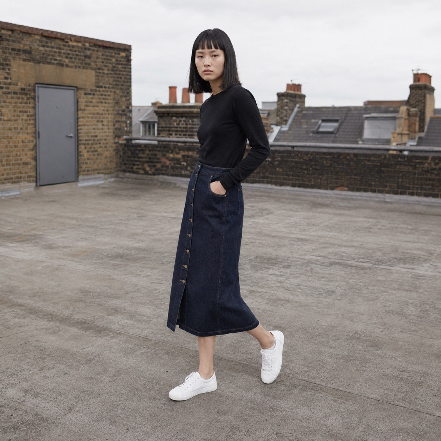Ganton Button Front Denim Skirt — Skirts & Dresses by YOON SYM. worn by a model.