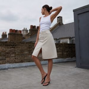 Carnaby A-Line Denim Skirt — Skirts & Dresses by YOON SYM. worn by a model.