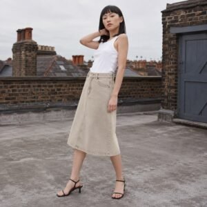 Carnaby A-Line Denim Skirt — Skirts & Dresses by YOON SYM. worn by a model.