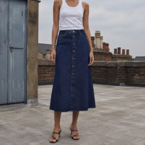 Broadwick Button Front Denim Skirt — Skirts & Dresses by YOON SYM. worn by a model.
