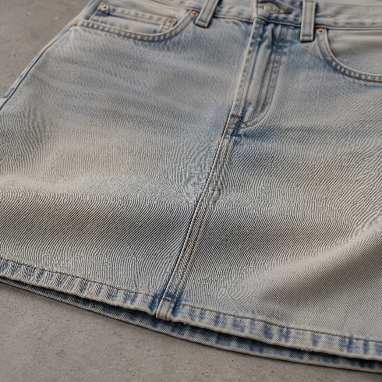 Noel Midi Denim Skirt — Skirts & Dresses by YOON SYM. close detail of the fabric and finish.