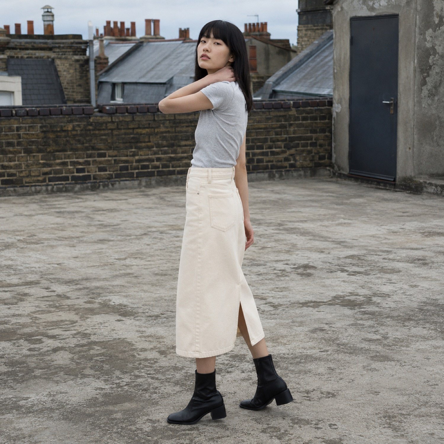 Silver Midi Denim Skirt — Skirts & Dresses by YOON SYM. worn by a model.