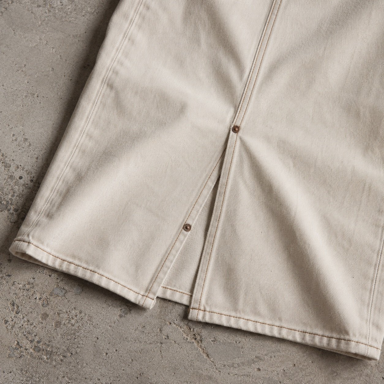Golden Midi Denim Skirt — Skirts & Dresses by YOON SYM. close detail of the fabric and finish.