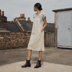 Kingly Denim Pinafore Dress — Skirts & Dresses by YOON SYM. worn by a model.