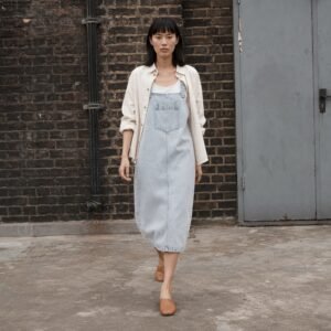 Ganton Denim Pinafore Dress — Skirts & Dresses by YOON SYM. worn by a model.