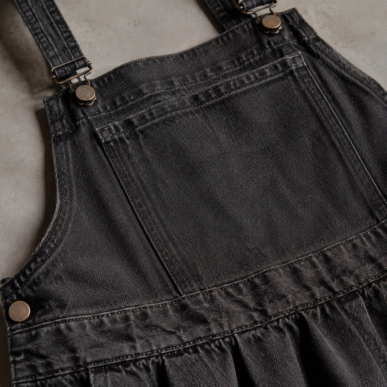 Carnaby Denim Pinafore Dress — Skirts & Dresses by YOON SYM. close detail of the fabric and finish.