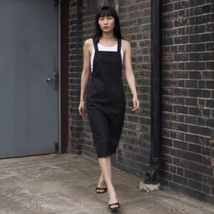 Carnaby Denim Pinafore Dress — Skirts & Dresses by YOON SYM. worn by a model.