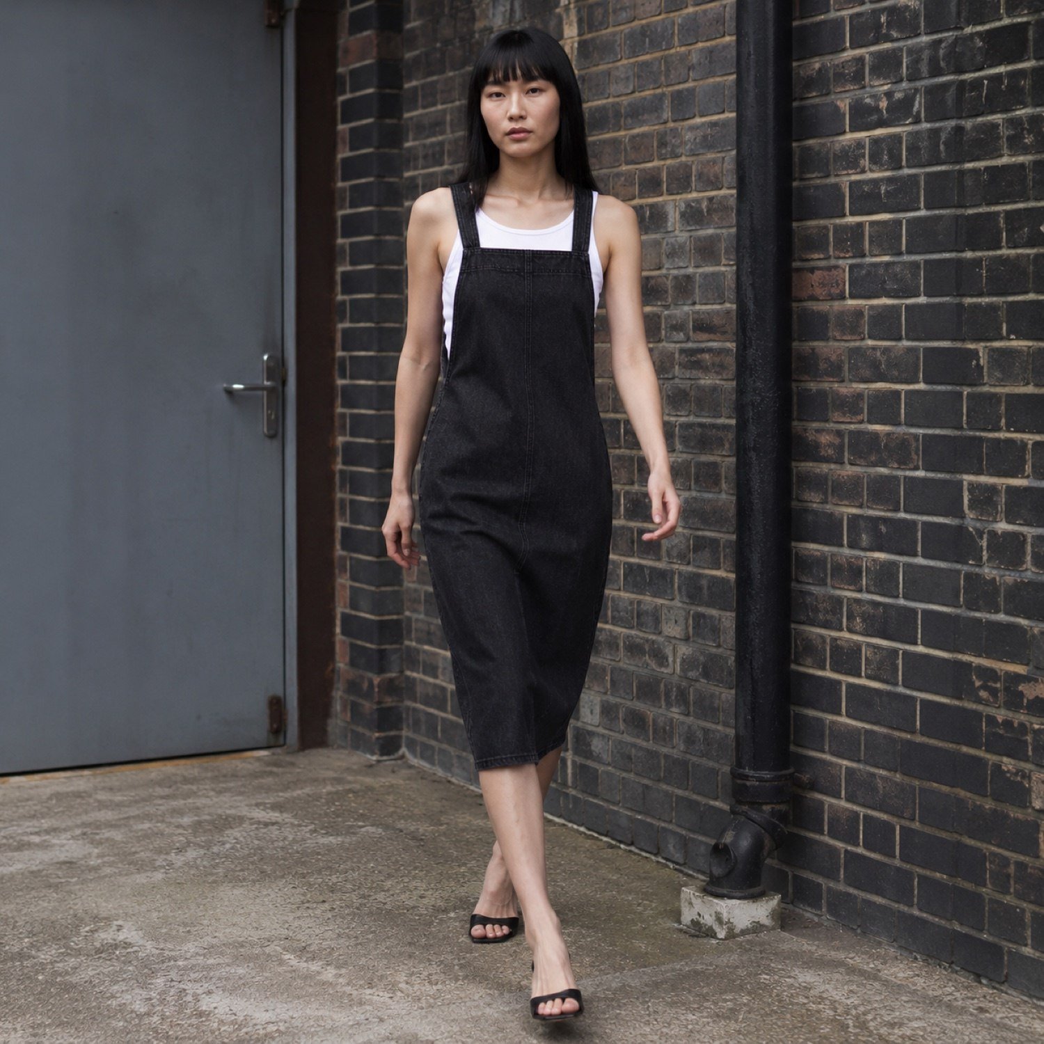 Carnaby Denim Pinafore Dress — Skirts & Dresses by YOON SYM. worn by a model.