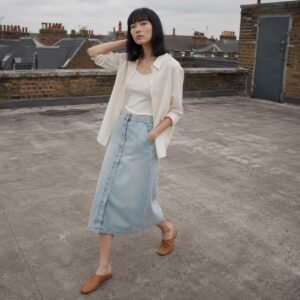 Broadwick Button Front Denim Skirt — Skirts & Dresses by YOON SYM. worn by a model.