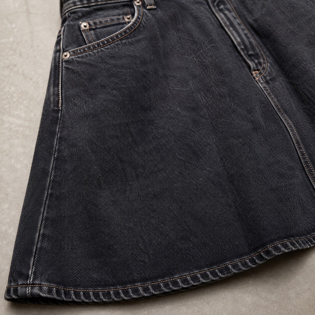 Foubert A-Line Denim Skirt — Skirts & Dresses by YOON SYM. close detail of the fabric and finish.