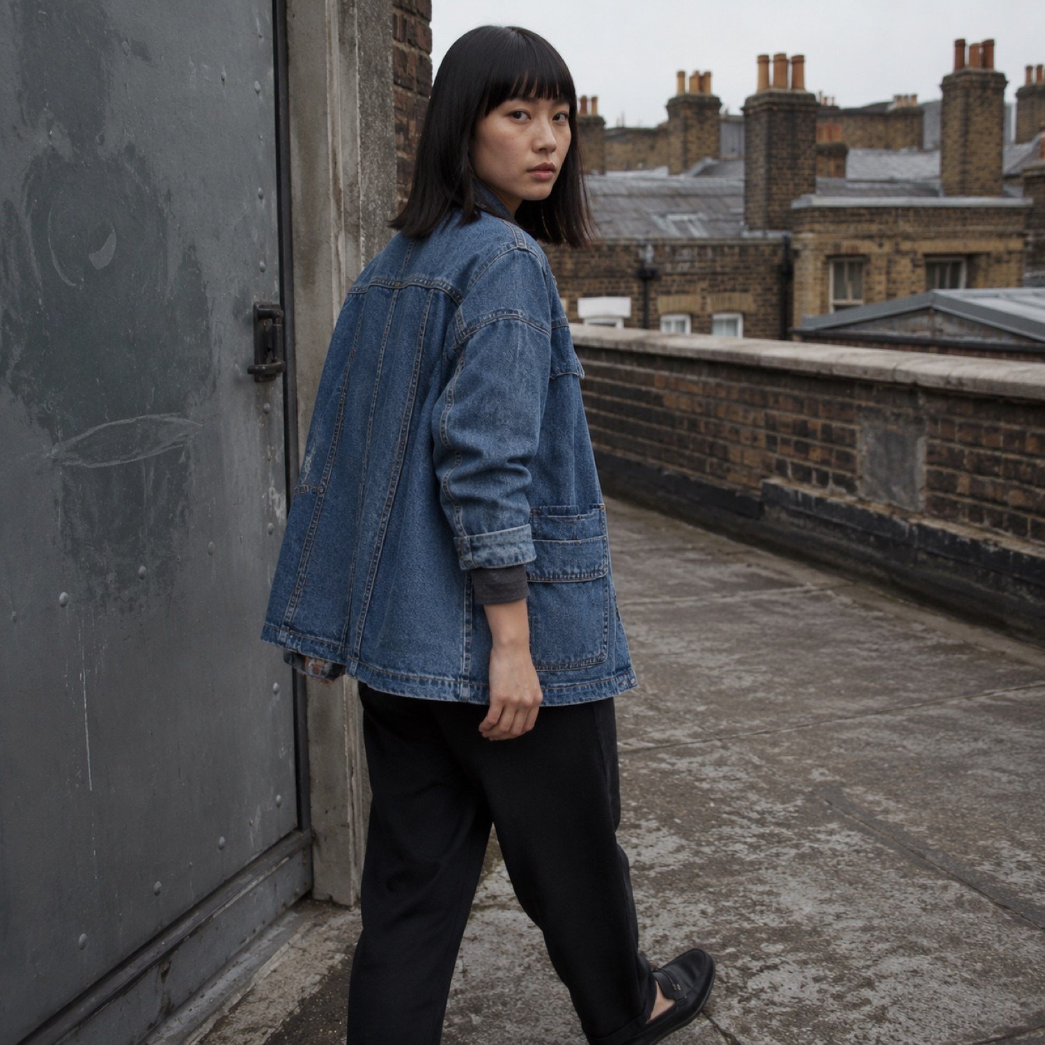 Broadwick Denim Chore Jacket — Denim Jackets by YOON SYM. worn by a model, side view.