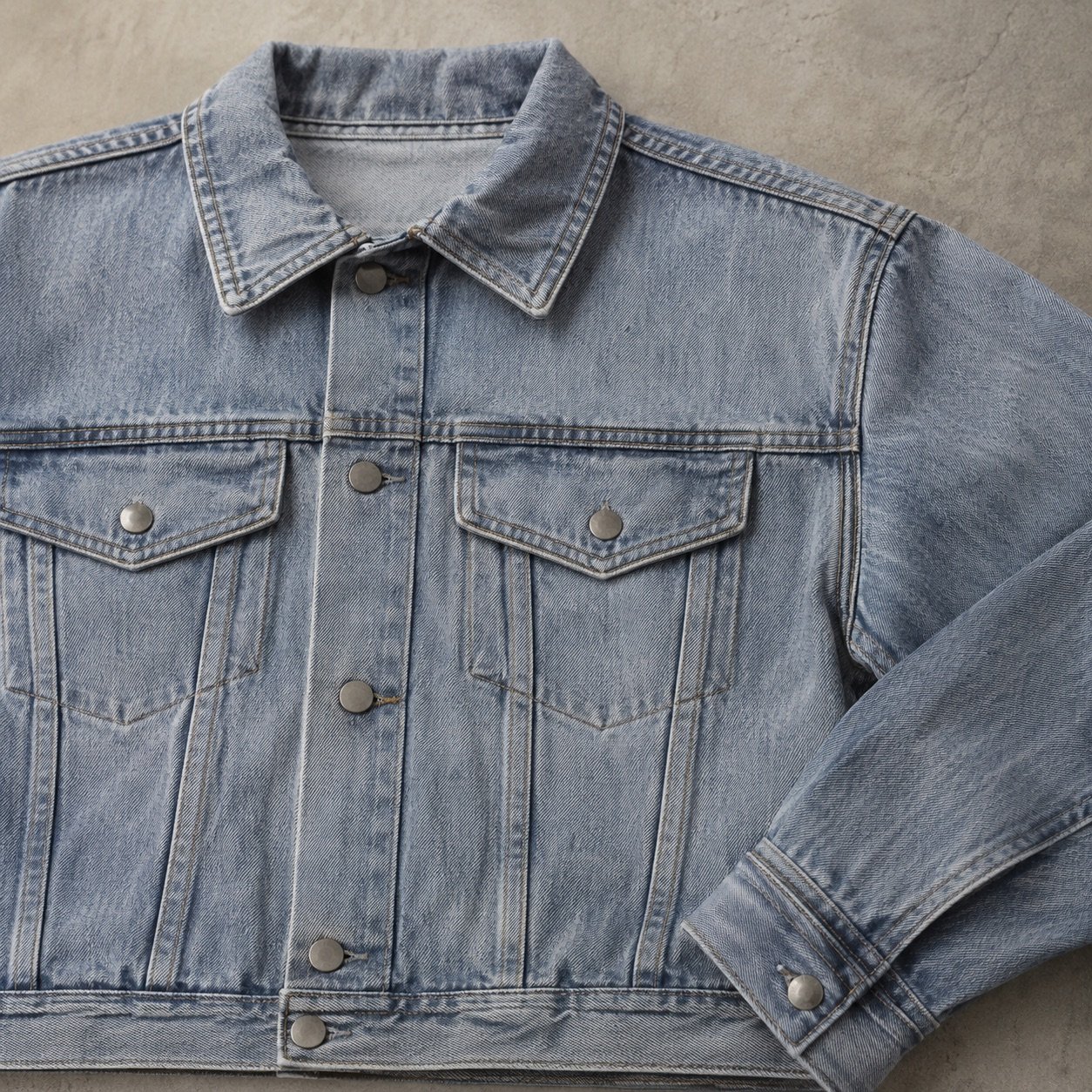 Marshall Cropped Denim Jacket — Denim Jackets by YOON SYM. close detail of the fabric and finish.