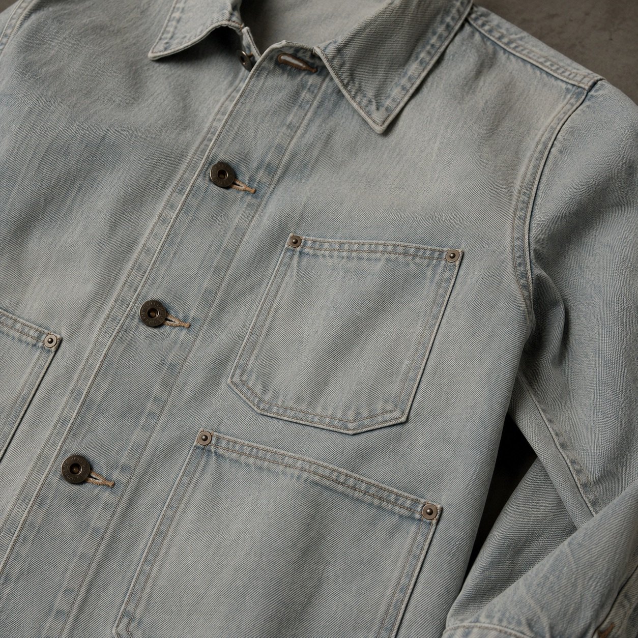 Beak Denim Chore Jacket — Denim Jackets by YOON SYM. close detail of the fabric and finish.