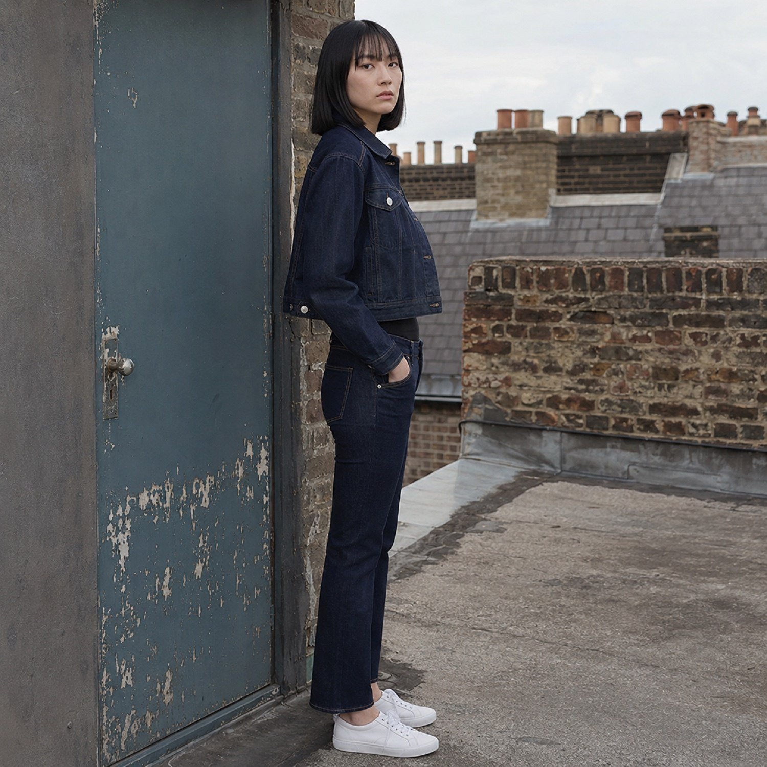 Silver Cropped Denim Jacket — Denim Jackets by YOON SYM. worn by a model, side view.
