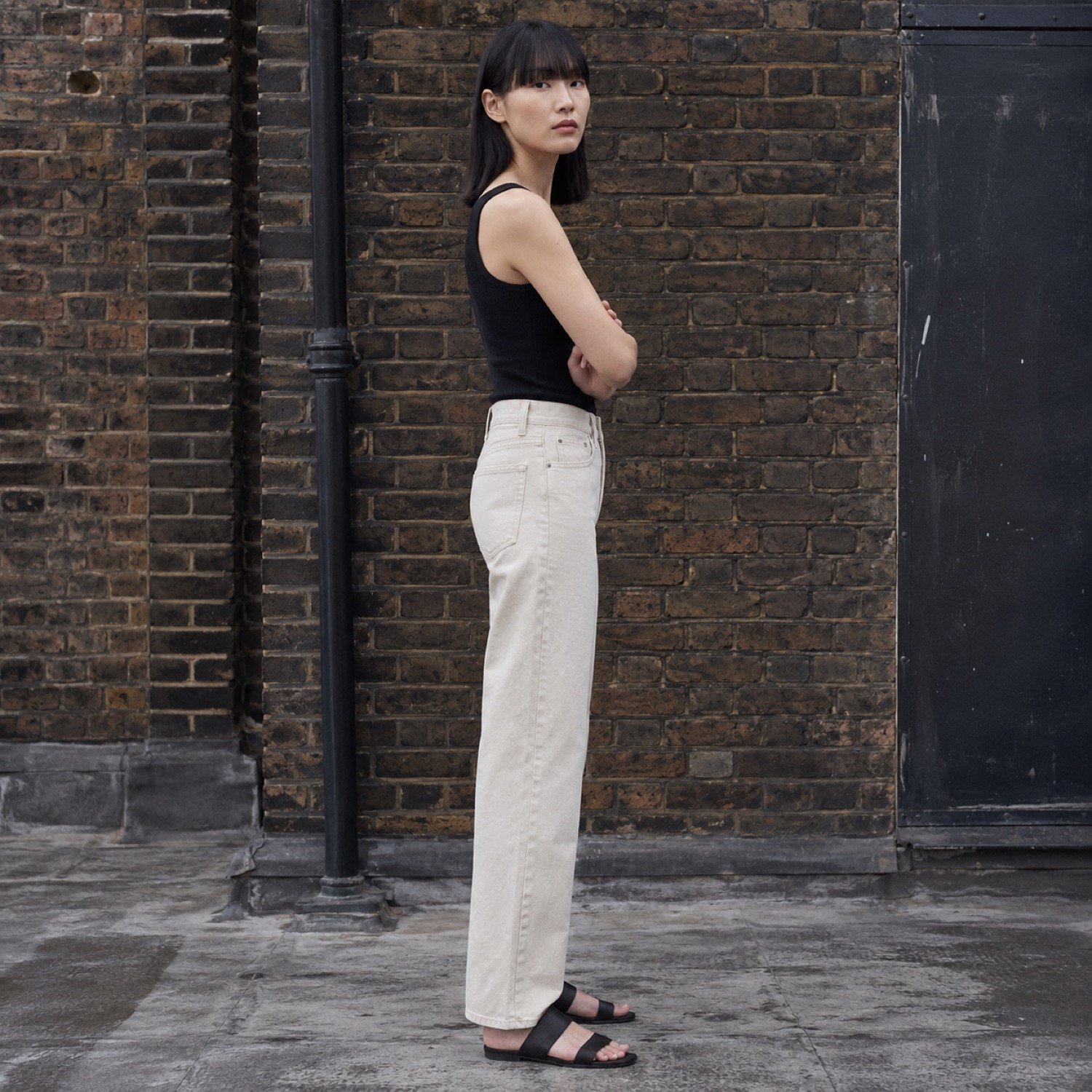 YOON SYM: Kingly High Rise Straight Jean, Jeans, worn by a model, side view.
