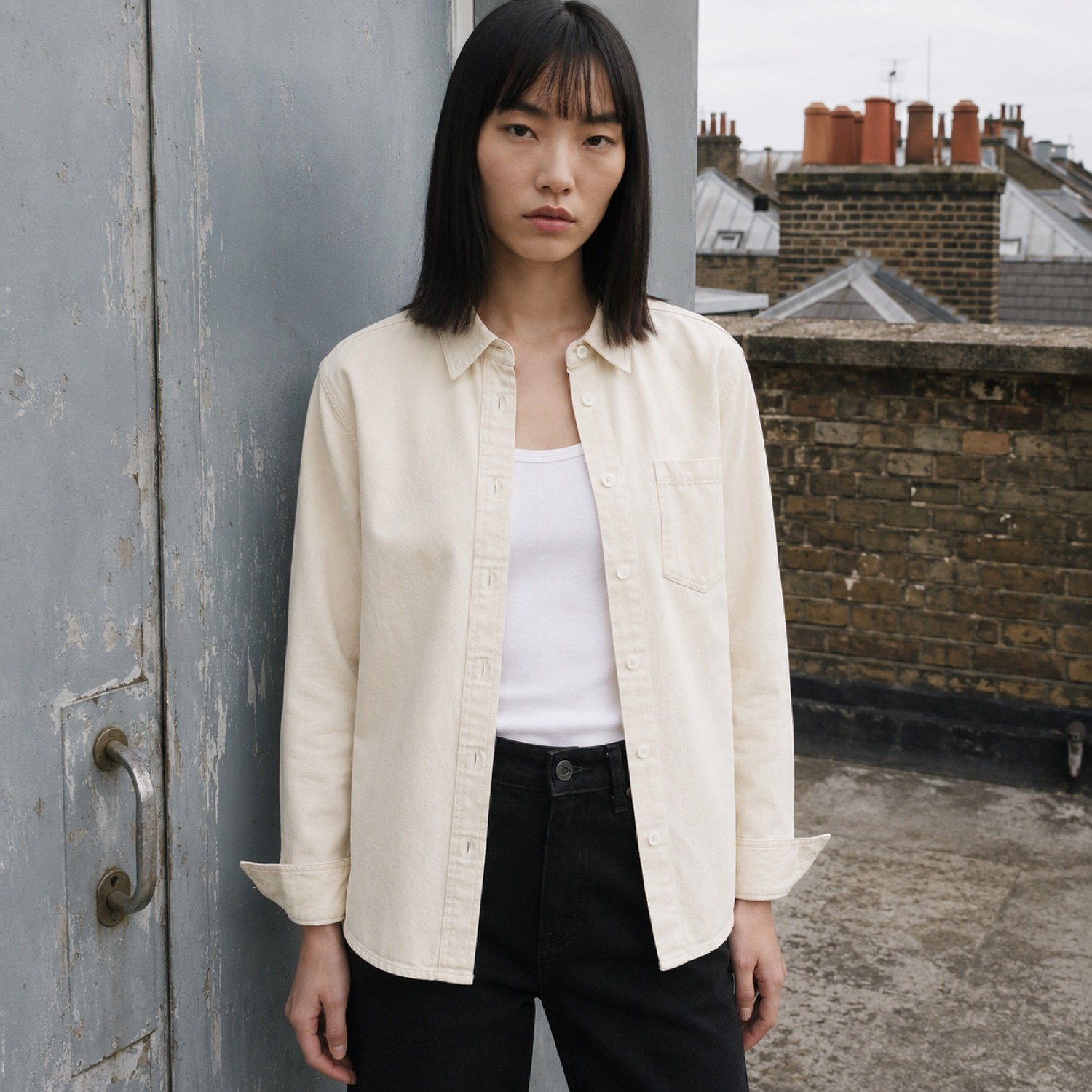 Noel Chambray Shirt — Denim Shirts by YOON SYM. worn by a model.